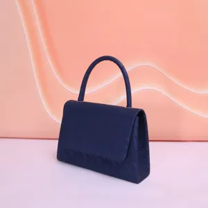 Sac à main en dentelle pour femme, élégant sac de soirée avec poignée et rabat.