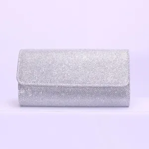 Silver glitter evening clutch bag detail view, sparkling party purse for women and formal events.