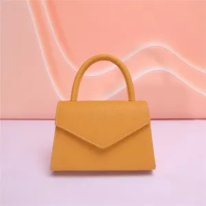 Borsa a mano da donna in pelle gialla con manico, elegante pochette da sera per ogni occasione.
