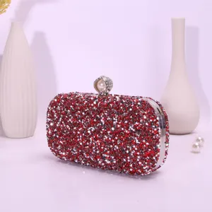 Exquisite red rhinestone evening clutch bag with pearl clasp, sparkling party handbag.