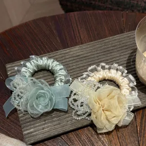Exquisite floral lace hair scrunchie detail shot, sweet crystal beaded hair tie for women.