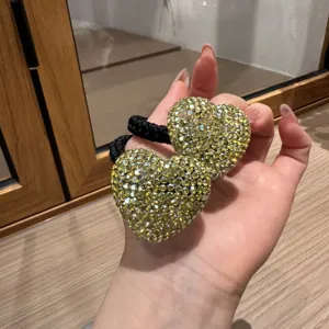 Sparkling rhinestone double heart hair tie, elegant crystal ponytail holder for daily wear.