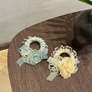 Sweet flower hair scrunchie with lace trim and pearls, elegant girlish hair tie for daily wear.