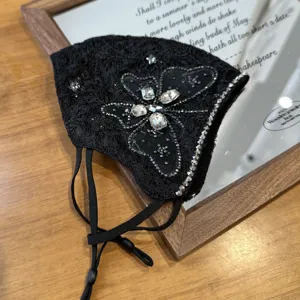 Exquisite black lace rhinestone mask with breathable design, elegant crystal butterfly decor.