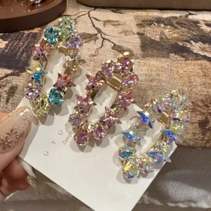 Crystal rhinestone hair clips for women, sparkling star duckbill side hairpins detail.
