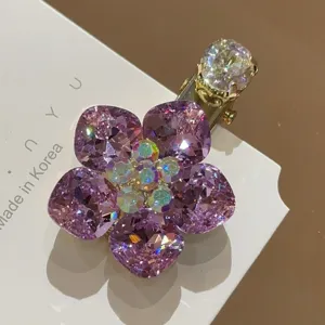 Pince a cheveux bec de canard fleur de cristal exquise avec strass scintillants pour frange de femme.