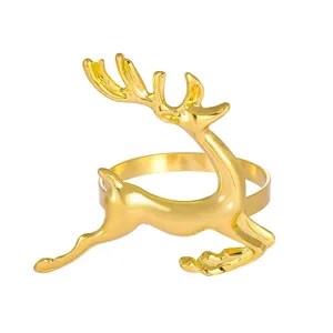 Rond de serviette renne doré pour déco de table de Noël, support élégant en métal.