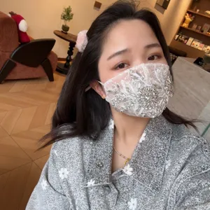 Chic rhinestone lace face mask for women, stylish decorative dustproof embroidered cover.