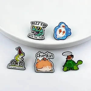 Close up detail of funny cartoon animal alloy enamel pins set featuring cute dinosaurs and frogs.