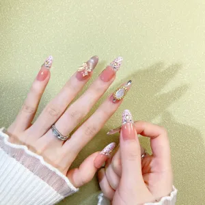 Luxury press-on nails with cat eye, tweed pattern, and sparkling rhinestones for women.