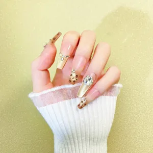Uñas postizas leopardo champán con pedrería plateada, set de manicura larga para mujeres.