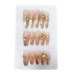 Uñas postizas hechas a mano con degradado ojo de gato pedrería mariposa encanto estilo.