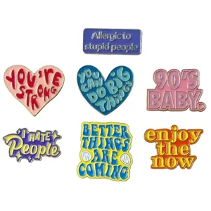 Creative English quote enamel pin set, stylish metal badge decor for apparel and bags.