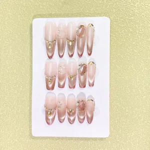 Uñas postizas hechas a mano de lujo degradado rosa nude ojo de gato con grandes pedrería