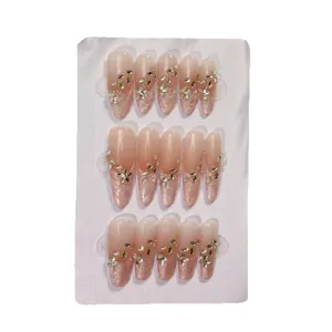 Handmade nude ombre press-on nails with delicate rhinestones and sparkling crystal long style.