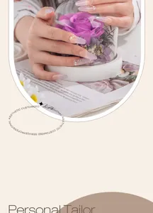 Luxury gradient press-on nails with sparkling rhinestones, medium-long elegant nail art detail.