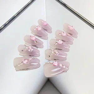 Uñas postizas press-on rosa violeta efecto ojo de gato mariposa diamantes de imitación