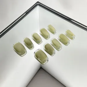 Avocado green press-on nails with cat-eye effect and glitter edge design, 10pcs fake nail set.