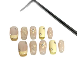 Handmade nude yellow press-on nails medium long set with sparkling rhinestones stars cute style
