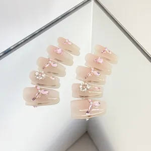 Handmade press-on nails with pink rhinestones and bow charms, sweet style false nails set.