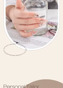 Close-up of handmade press-on nails with 3D painting, cat-eye effect and crystal rhinestones.