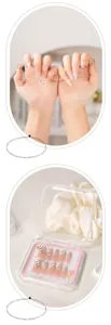 Ongles press-on longs et amandés exquis avec dégradé nude et strass brillants pour femmes.