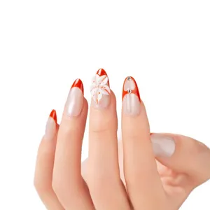 Handmade press on nails with elegant red French tips, 3D floral art and sparkling rhinestones.