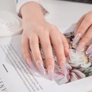 Luxury gradient press-on nails with sparkling rhinestones, elegant medium long fake nail art.