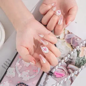 Handmade press-on nails with 3D cherry blossom flowers, elegant gradient pink almond fake nails