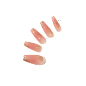 Uñas postizas hechas a mano medianas largas nude rosa con elegante diseño de líneas de oro