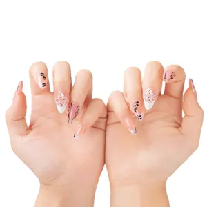 Handmade press-on fake nails, sweet pink floral art, elegant almond shape for women styling.