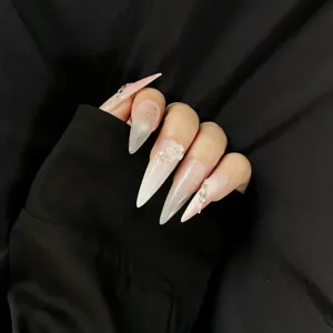 Handmade long stiletto press-on nails with gradient pink silver, rhinestones and 3D floral details.