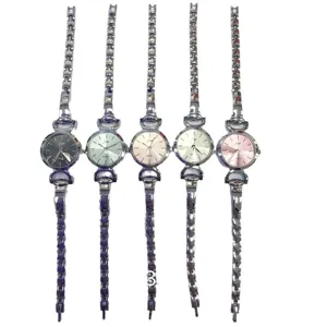 Stylish women quartz watch featuring a slender metal steel bracelet and multi-color dial set.