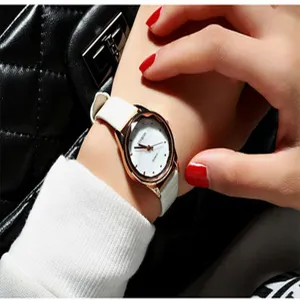XINKON vrouwen quartz horloge witte lederen band roségouden bezel elegante polshorloge