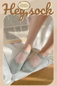 Close-up detail of women breathable mesh lace boat socks with comfy cotton bottom in light green.