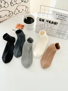 Minimalist solid color ankle socks for men and women, comfortable ribbed casual short socks.
