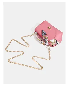 Pink leather chain shoulder bag with silk scarf accessory for women summer style detail view