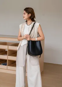 Genuine leather vintage bucket shoulder bag for women stylish everyday commuting crossbody bag