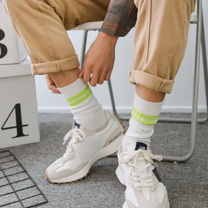 Unisex mid-tube sports socks, white chunky knit with neon green double stripes streetwear.