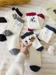 Cute fuzzy winter warm wool socks with sweet cartoon bear embroidery and contrast color design.