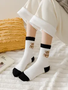 Thickened warm wool mid-calf socks for women featuring cute flocked bear design and stylish color block.