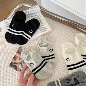 Summer breathable cotton invisible boat socks with cute smiley embroidery and classic stripes.