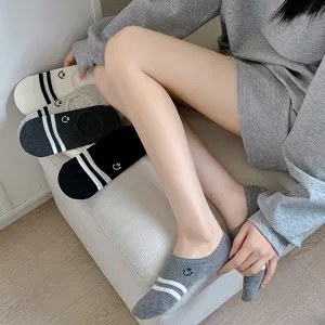 Summer thin invisible boat socks with cute smiley embroidery and classic stripes for women.