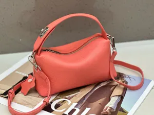Coral pink genuine leather handbag soft pillow bag chic top handle detail view new style