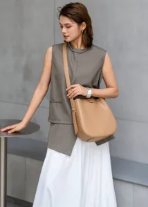 Detailed view of the stylish leather bucket bag showcasing fine texture and stitching.