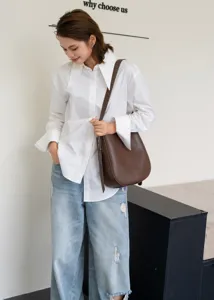 Genuine leather vintage bucket bag for women, stylish shoulder and crossbody handbag.