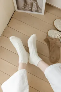 Detailed view of solid color ribbed short socks for casual summer wear, comfortable fit.