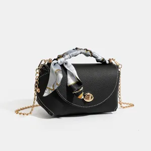 Black leather chain shoulder bag for women, stylish crossbody handbag with silk scarf handle.