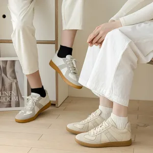 Classic retro casual sneakers paired with comfortable low-cut solid socks for daily wear.