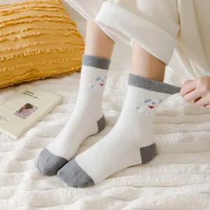 Thickened warm wool winter socks for women featuring cute cartoon bear pattern and color block.